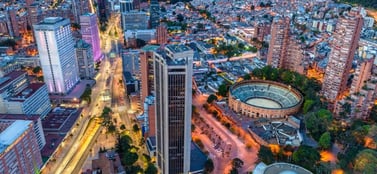 Bogotá Colombia cityscape at twilight signifying strategic corporate growth and market expansion