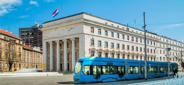 Zagreb Croatia city centre with modern tram and government building signifying agile progress and strategic market foundation