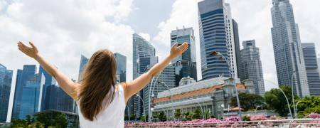 Starting-business-girl-arms-raised-in-singapore