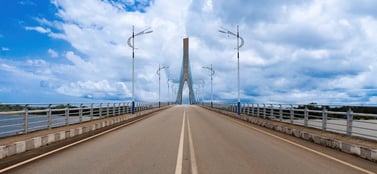 Modern bridge in Equatorial Guinea symbolising pathways between business structures like LLCs, JVs, and branches in a growing economy.