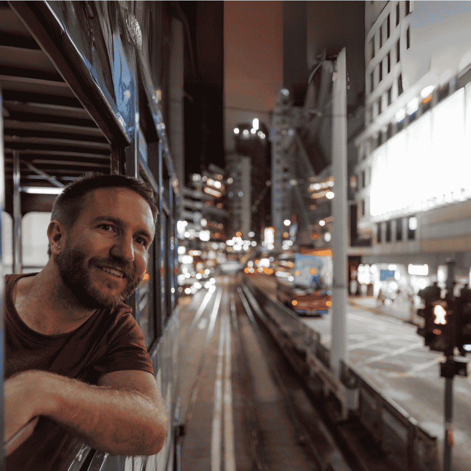 Man looking out of bus